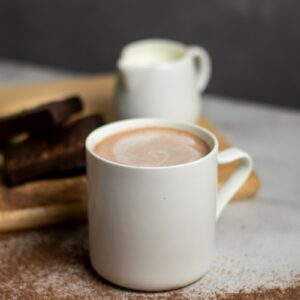 white ceramic mug with coffee